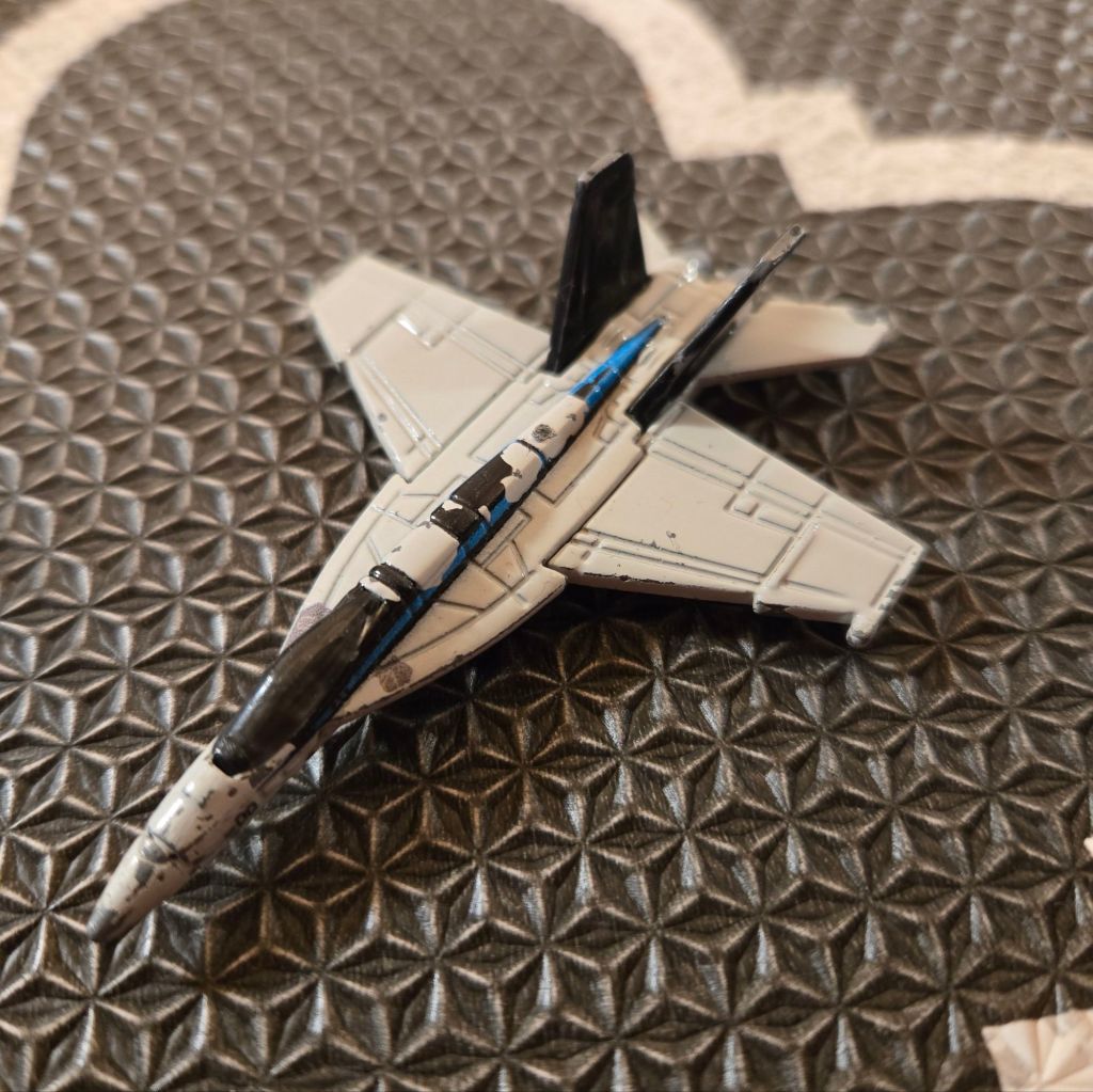 A small toy fighter jet.